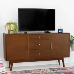 Mid-Century Modern Wood Console TV Stand For TVs Up To 65" - Saracina Home 13 Mid-Century Modern Wood Console TV Stand For TVs Up To 65" - Saracina Home -HOMES: Inside + Out Store GUEST cb85f3af 3c20 42f9 8a52 5c742cd3a8be